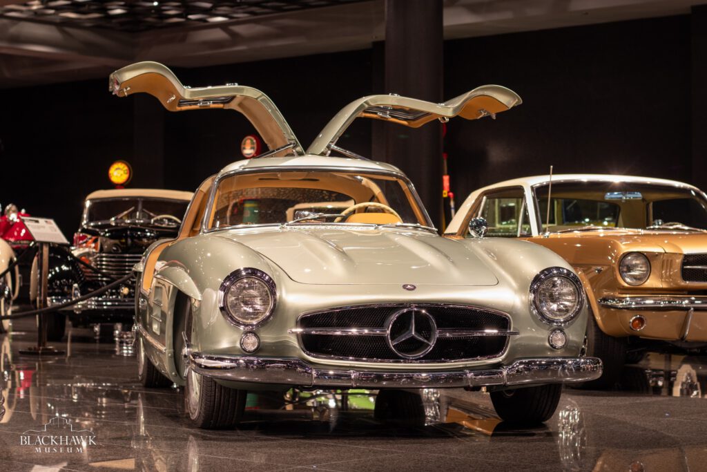 A grey 1955 Mercedes-Benz 300SL Gullwing