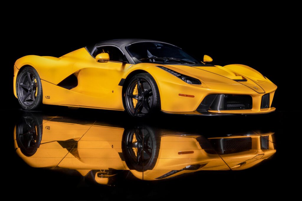 A yellow 2017 Ferrari LaFerrari Aperta